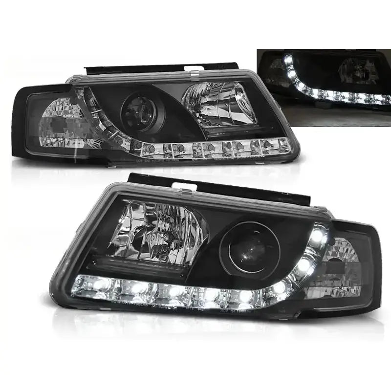 Frontlykter Vw Passat B5 3B svarte med klare linser og LED-lyslist, sett fra skrå vinkel.