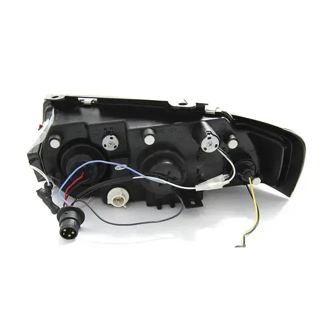 Headlamp Vw Passat B5 Angel Eyes CCFL Black vist bakfra med synlige pærer, kontakter og ledninger.