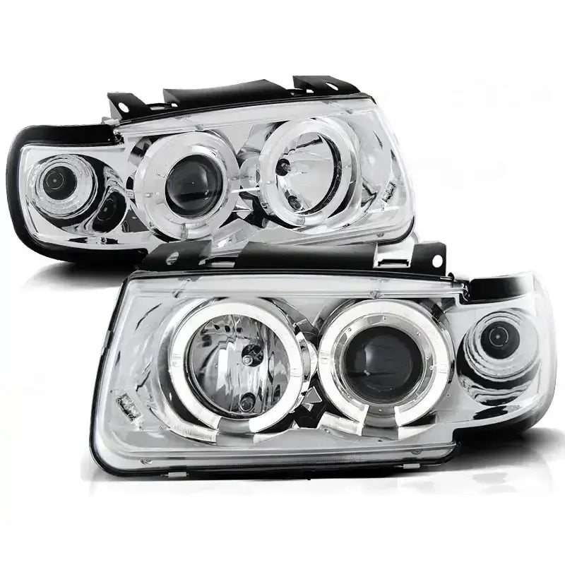 Frontlykter Vw Polo 6N Angel Eyes med klare glass og sølvdetaljer sett fra skrå vinkel.