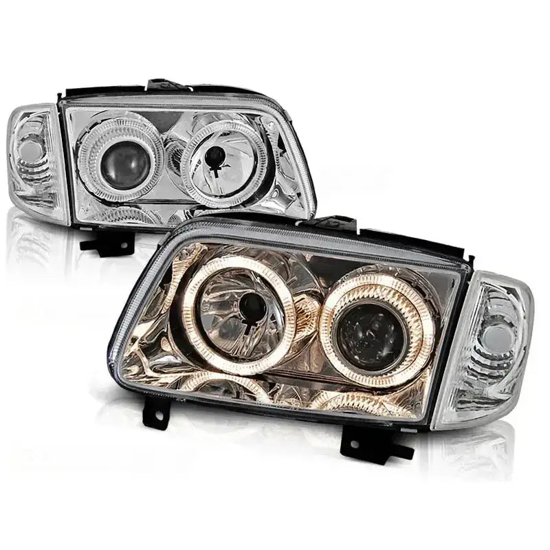 Hovedlykter Vw Polo 6N2 Angel Eyes Chrome med doble runde lys og LED-ringer, sett fra skrå vinkel.