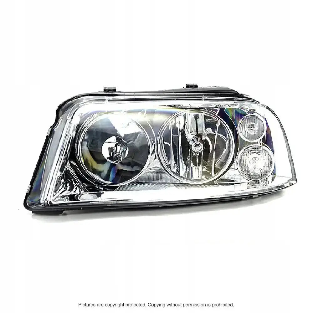 Hovedlys Vw Sharan 04-10 H7/H1 sett forfra med klart glass og synlige reflektorer.