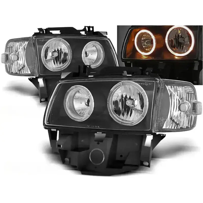 Frontlykter Vw T4 Angel Eyes Black i svart plast med klare glass og tent oransje og hvite lysringer.