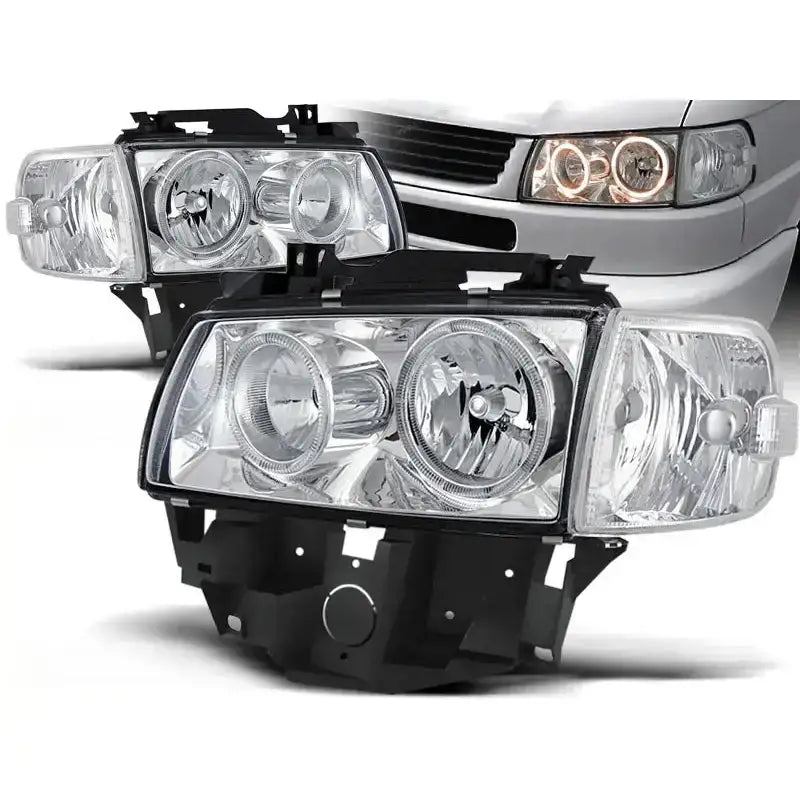Frontlykter Vw T4 Angel Eyes Chrome med sorte innramminger og runde lyselementer, sett skrått.