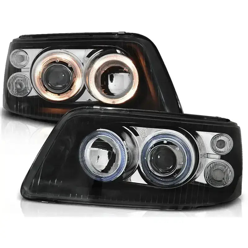 Hovedlykter Vw T5 Angel Eyes Black med sort ramme, klare glass og sirkulære lysrør.