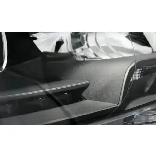 Headlights Vw T5 2010-15 Tru DRL Xenon Look Black med kromdetaljer og teksturert sort overflate.