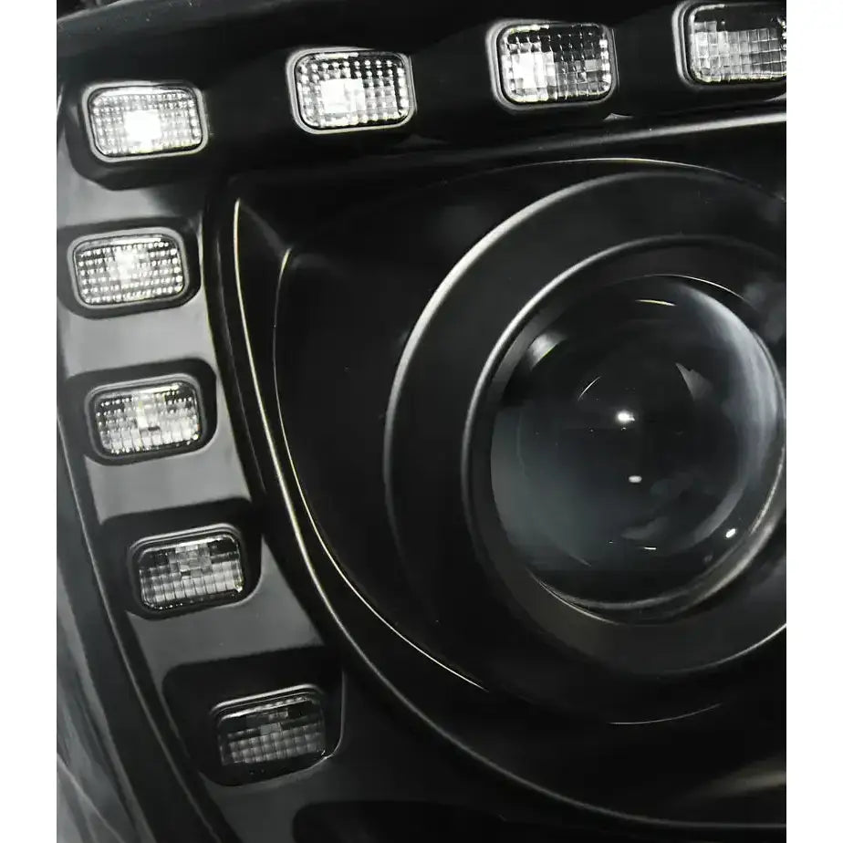 Headlights Vw T5 2010-2015 Black Tru DRL nærbilde med klare LED-innsatser og rund linse.