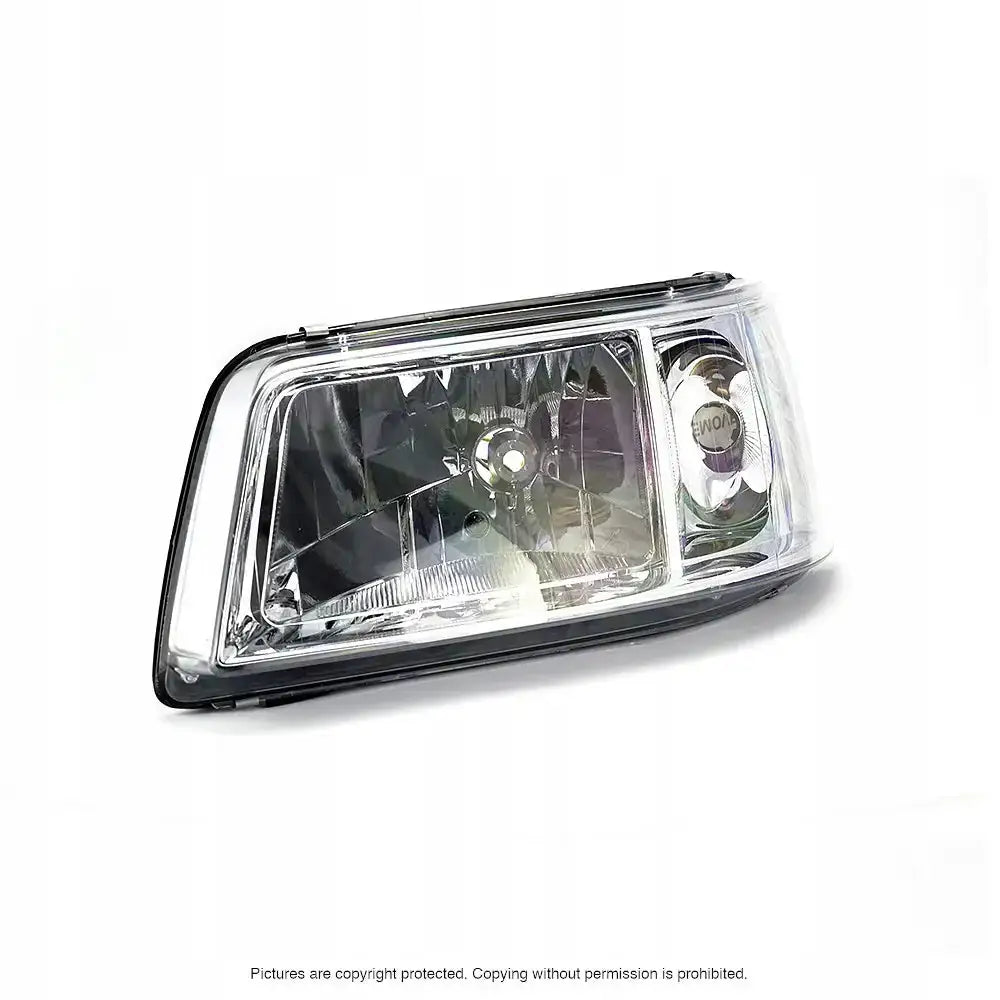 Hovedlykter Vw T5 Transporter 03-09 H4 med klart glass, kromdetaljer og svart kantlist, skrå vinkel.