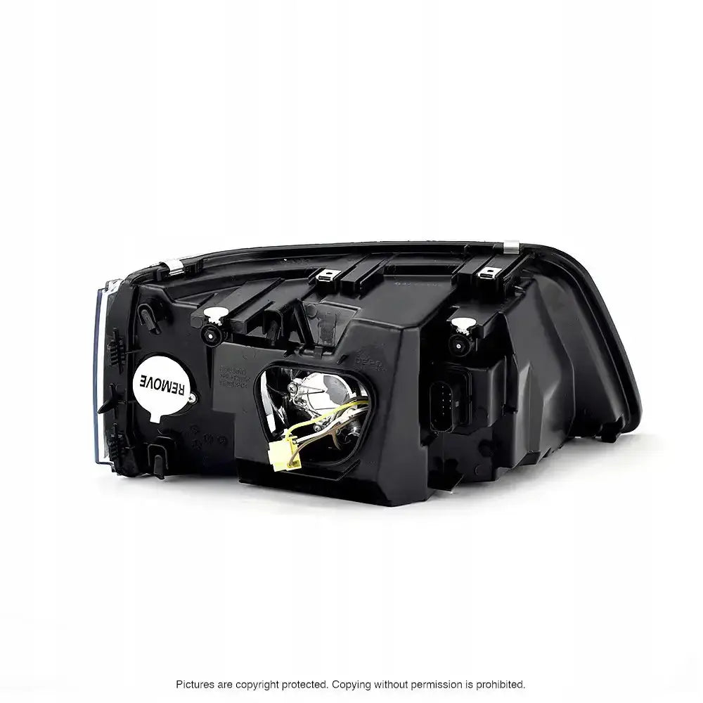 Headlamp Vw T5 Transporter 03-09 sett bakfra med synlige kontakter, reflektor og “REMOVE”-etikett.