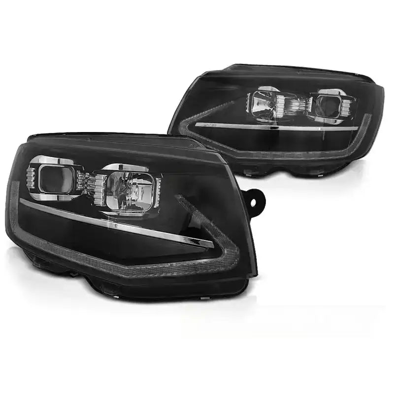 Frontlykter Vw T6 15-19 Tube Light Black med LED-lysstriper, sett fra skrå vinkel mot hvit bakgrunn.