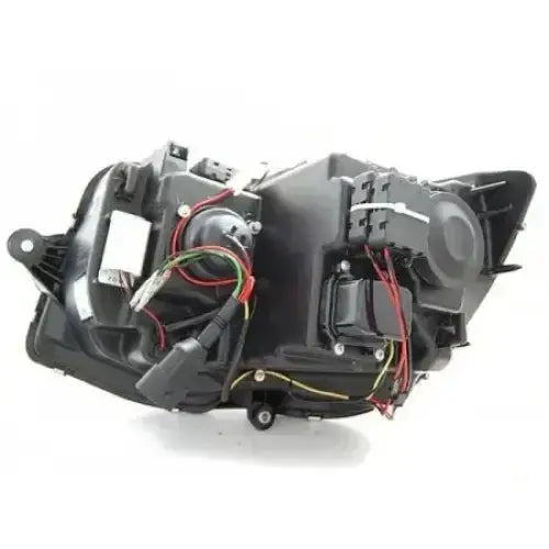 Headlights Vw T6 15- Black Tube Light Led SEQ DRL sett bakfra med synlige ledninger og komponenter.