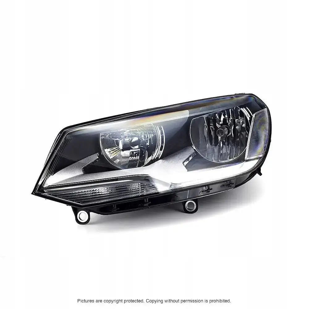 Hovedlys Vw Touareg 10-14 sort billykt med klar front, synlige reflektorer og pærer fra siden.