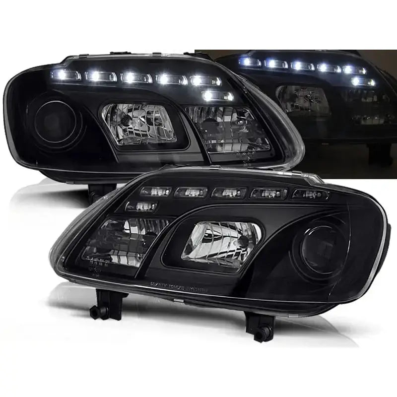 Frontlykter Vw Touran 02.03-10.06 Caddy Black LED, to svarte lykter med klare linser og LED-lys.