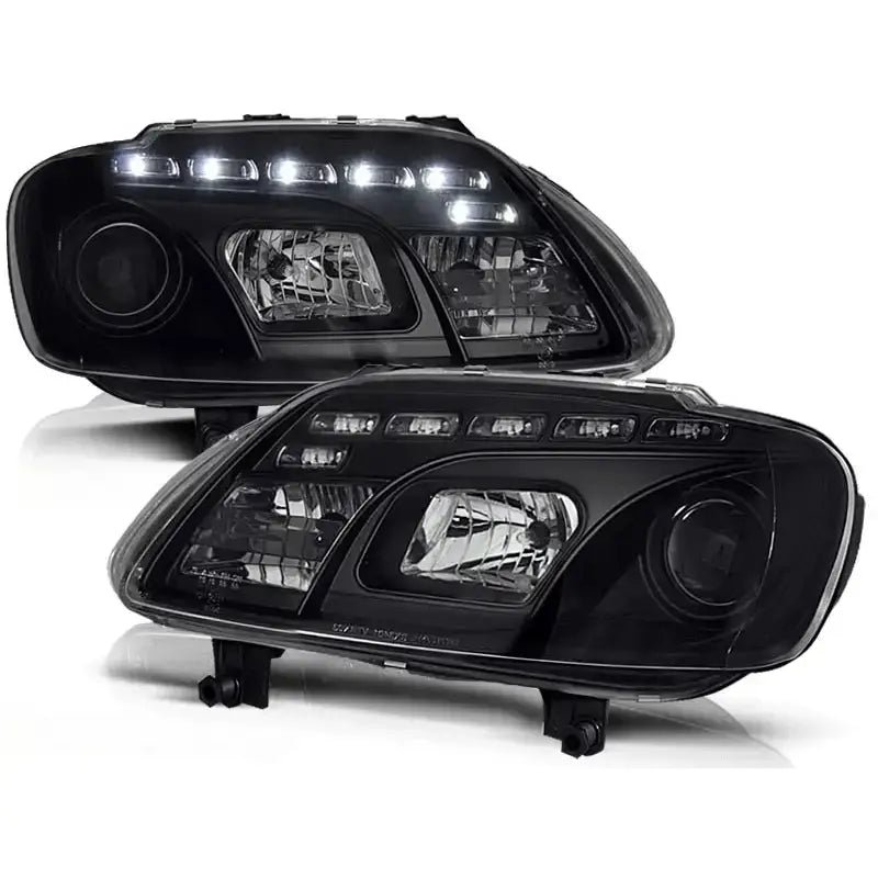 Hovedlykter Vw Touran 02.03-10.06 Caddy Black LED med integrerte LED-lys og reflekterende detaljer.