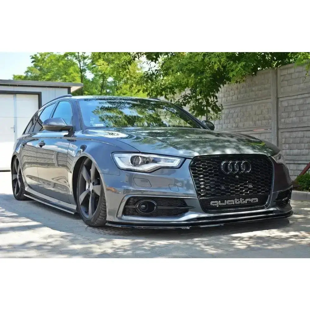 Frontleppe Audi A6 C7 S-Line V.1 sett fra venstre forhjørne med svarte felger og quattro-grill.