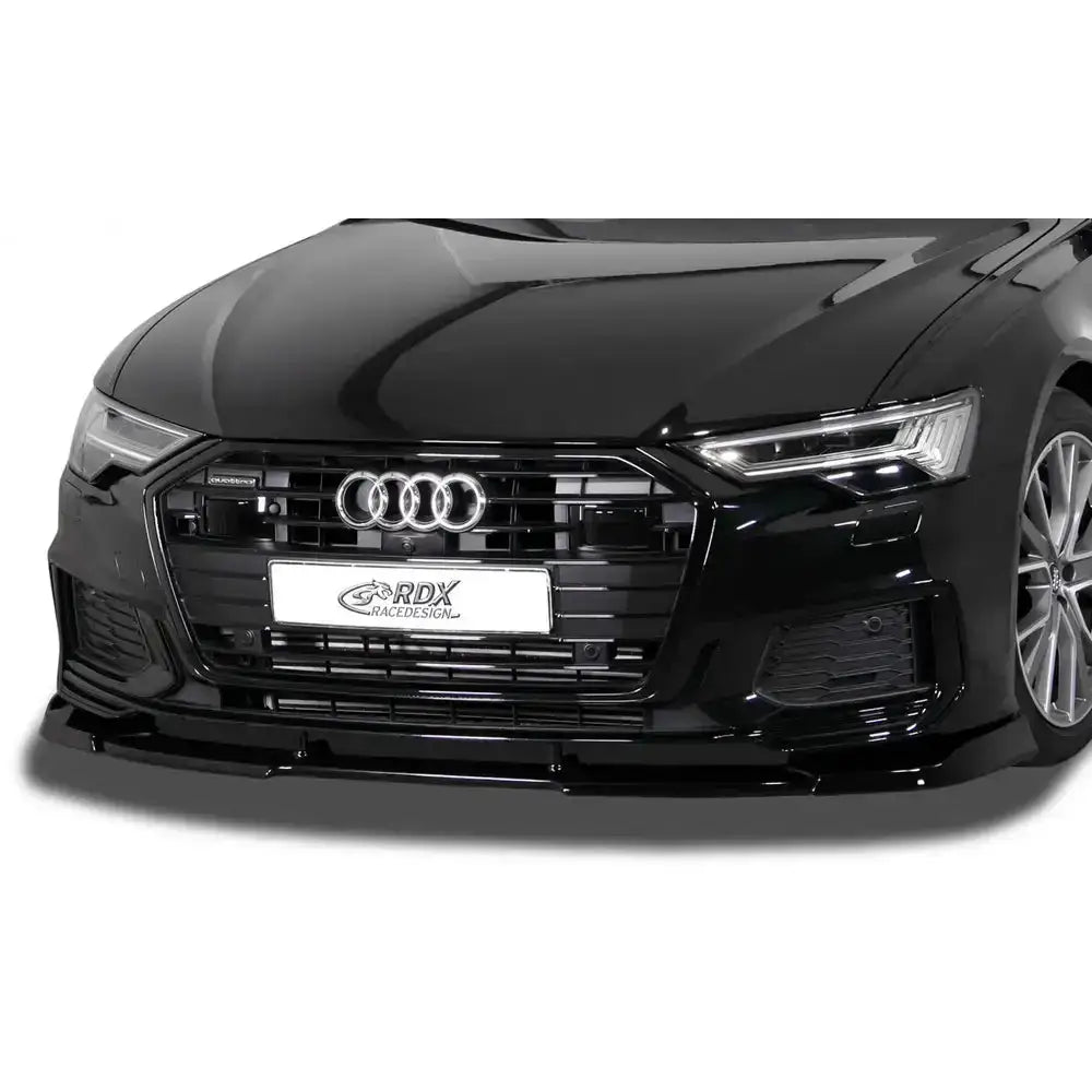 Frontspoiler Audi A6 C8 S-Line med sort, skinnende spoiler under støtfangeren og kromdetaljer rundt grill.