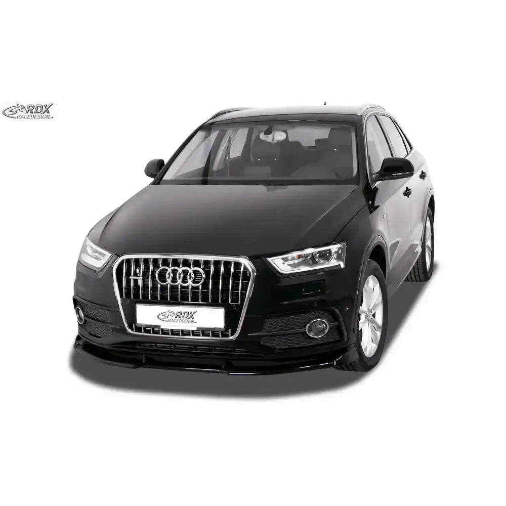 Frontleppe Audi Q3 8U S-Line sett forfra, viser svarte detaljer og kromgrill mot hvit bakgrunn.