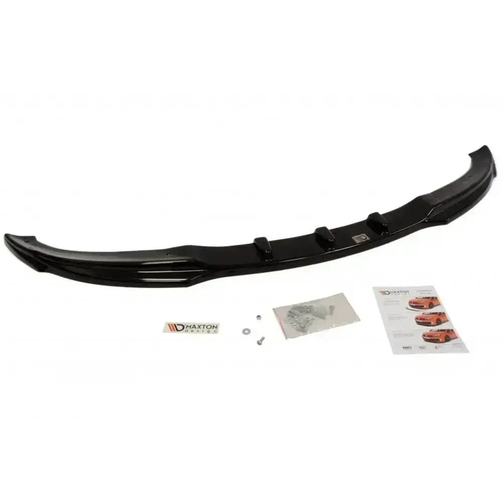 Frontleppe til BMW E46 Coupe Facelift, sort plast med skruer, instruksjonshefte og merkeplate på hvit bakgrunn.