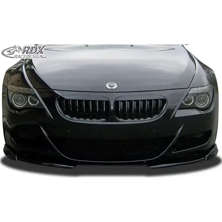 Frontleppe til BMW 6 E63 M6, sort bil sett forfra med grill og hovedlykter, blank finish.