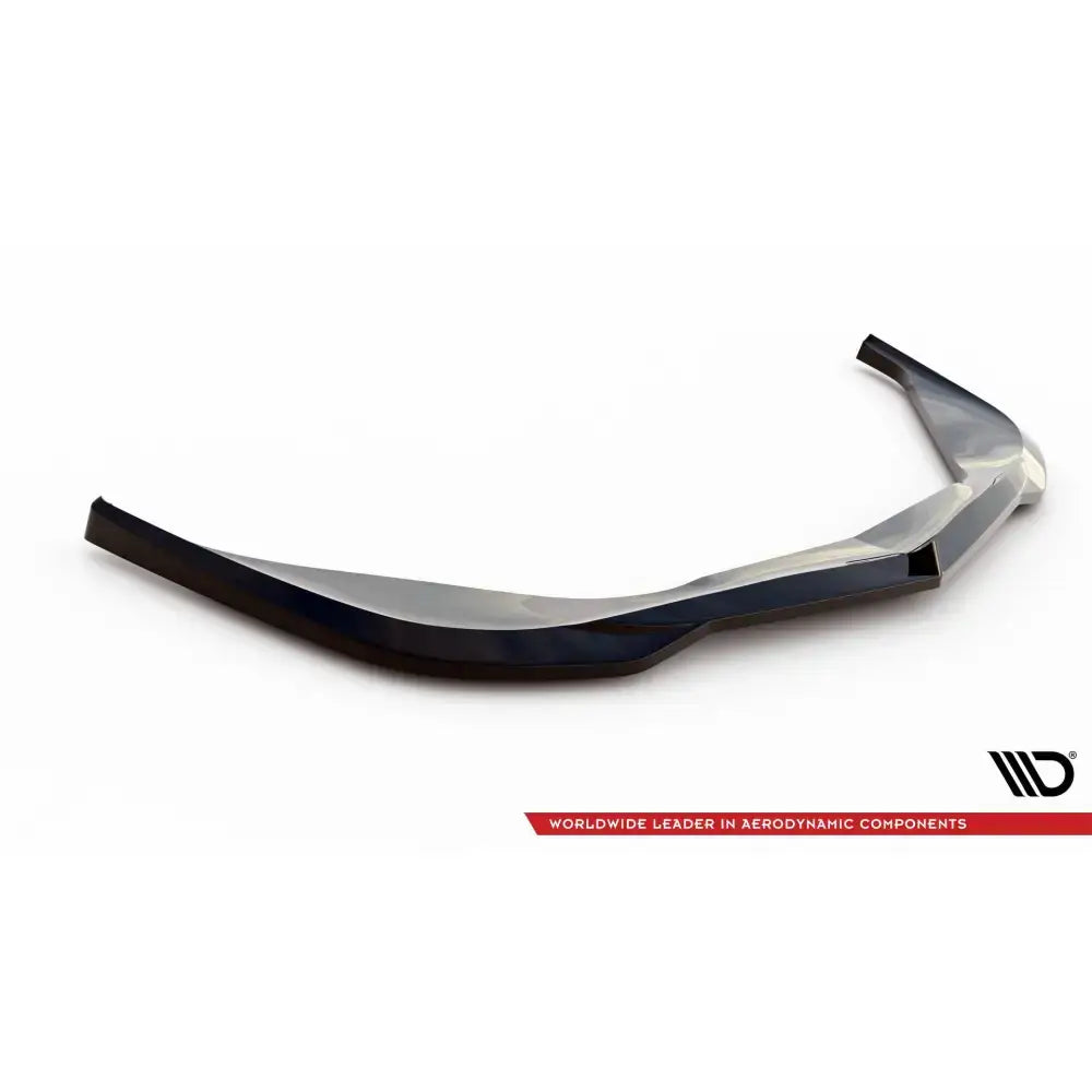 Front splitter til Chevrolet Corvette C5, svart og glanset med aerodynamiske kanter, vist fra siden.