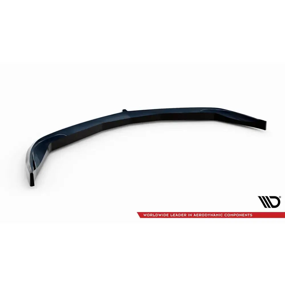 Front lip til Chevrolet Corvette C6, sort buet spoiler med glanset overflate og logo på hvit bakgrunn.