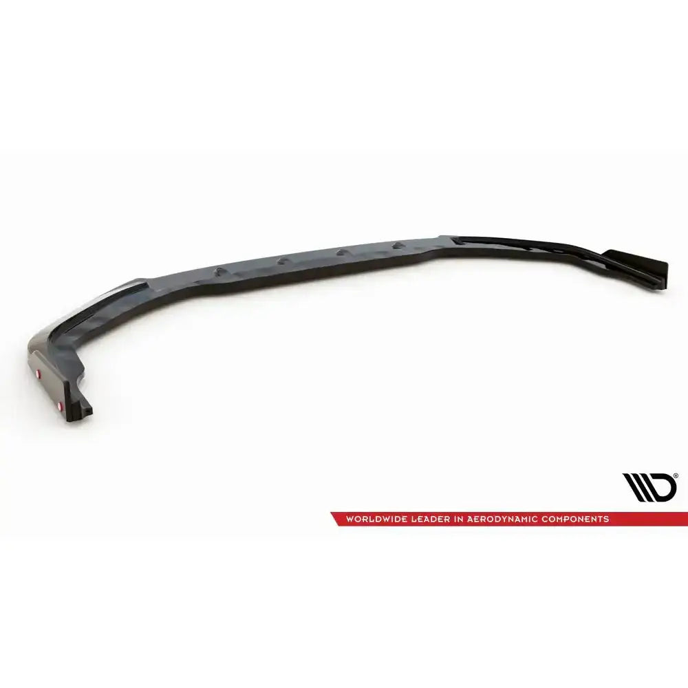 Frontspoiler Nissan GTR R35 Facelift 11-16 med flaps, svart og kantet, sett skrått ovenfra mot hvit bakgrunn.