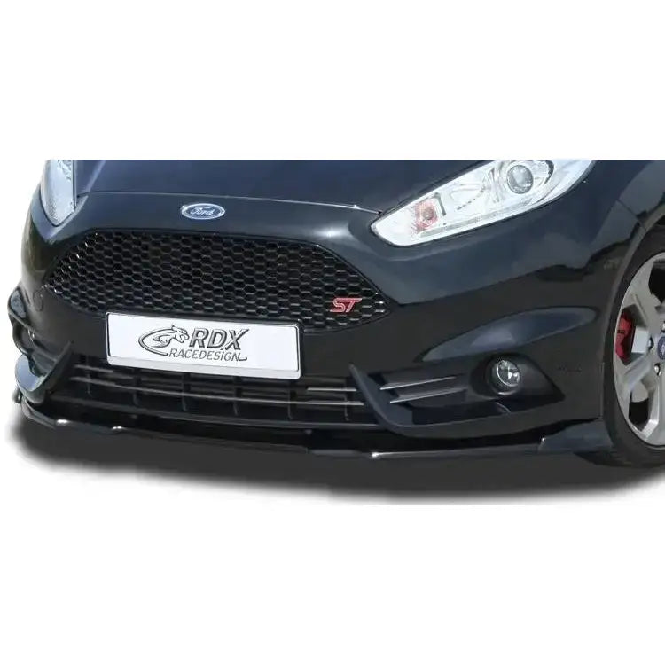 Frontspoiler til Ford Fiesta ST MK7 13-17 i svart plast, montert foran med synlig RDX RaceDesign-logo.