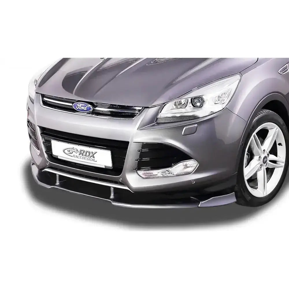 Frontspoiler Ford Kuga 2 DM2 12-16 montert under støtfanger på grå bil, nærbilde med lykter og felger.