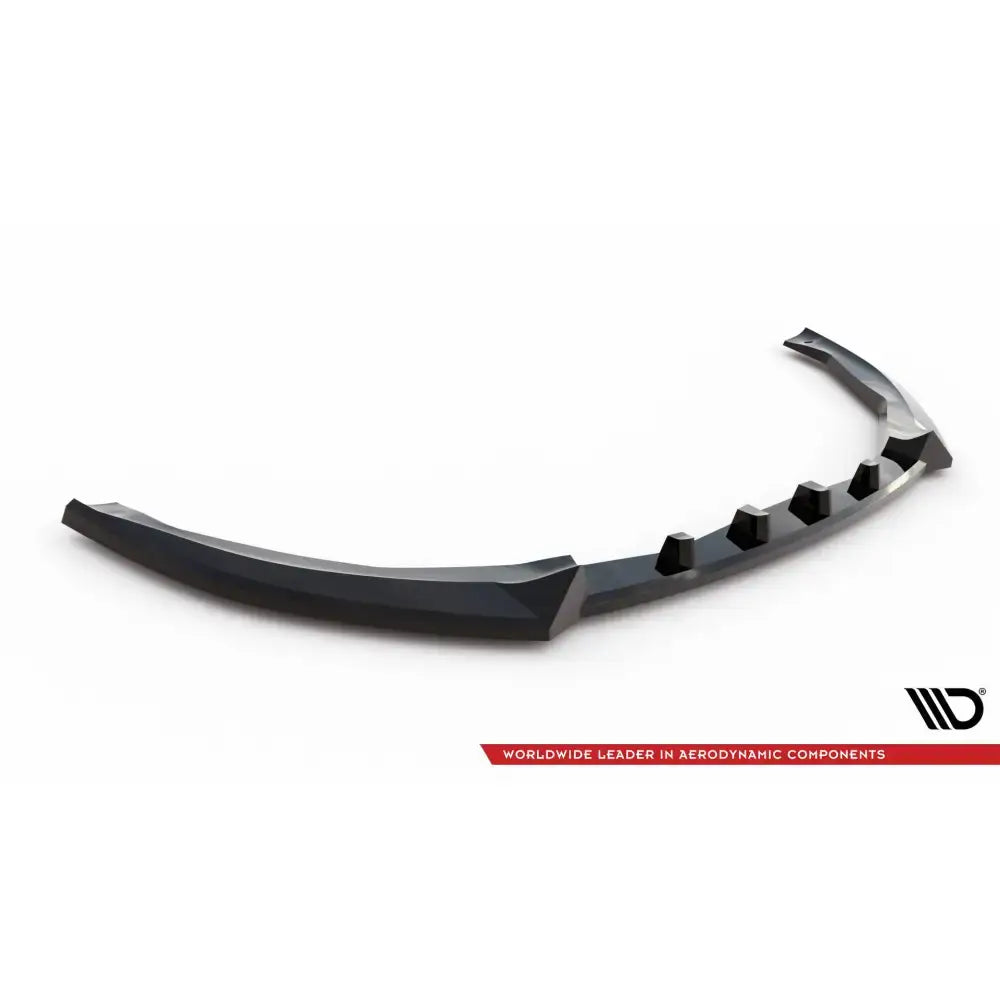 Front lip til Ford Mondeo Sport Mk5 i sort plast med aerodynamiske former og fire vertikale finner.