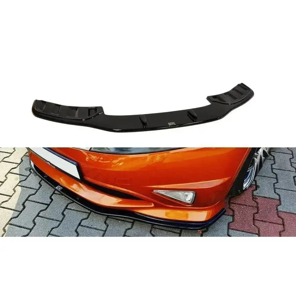Frontspoiler til Honda Civic VIII Type S/R i sort blank plast sett ovenfra montert på oransje bil.