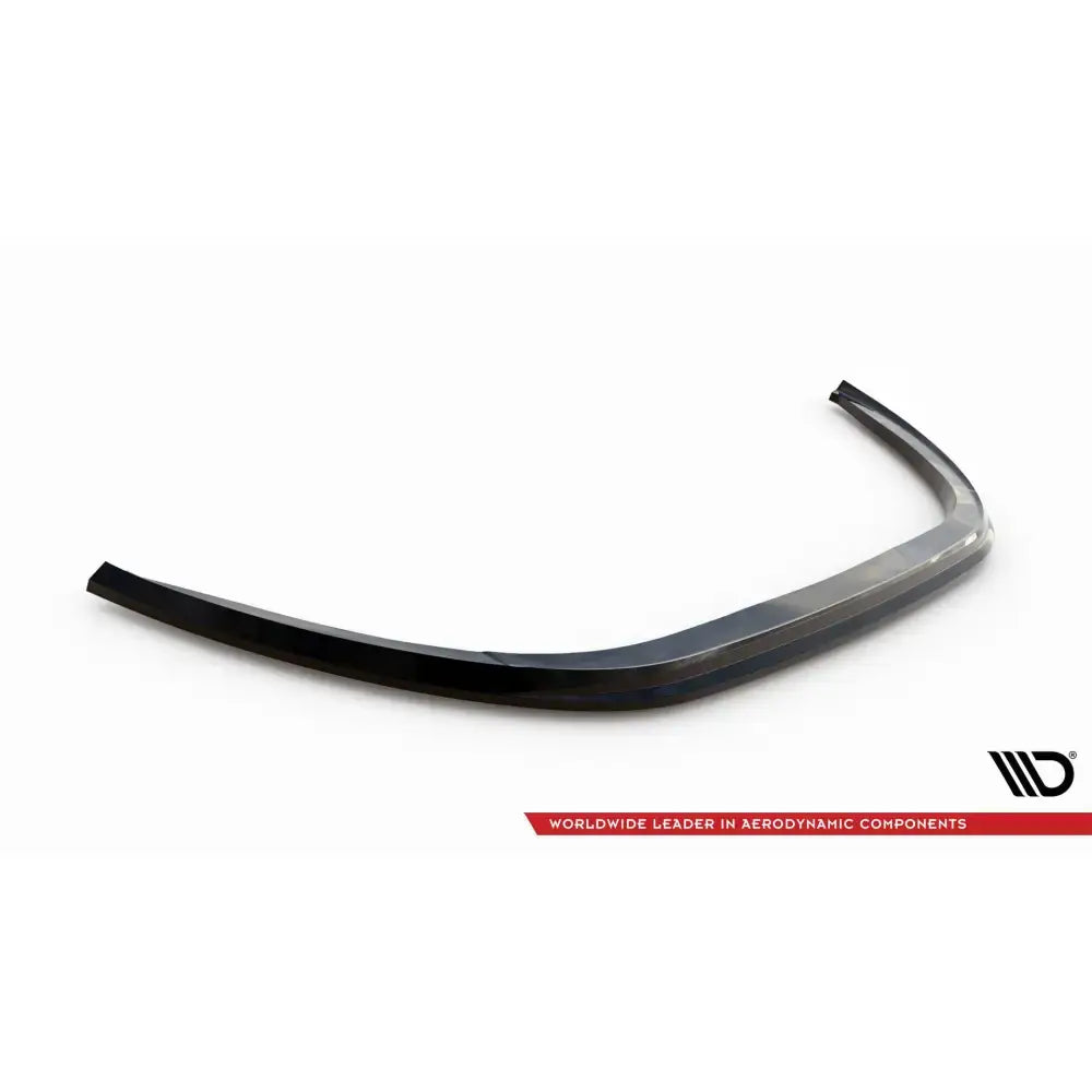 Frontspoiler til Kia Optima Mk3 i svart, blank utførelse, skrått ovenfra mot hvit bakgrunn.