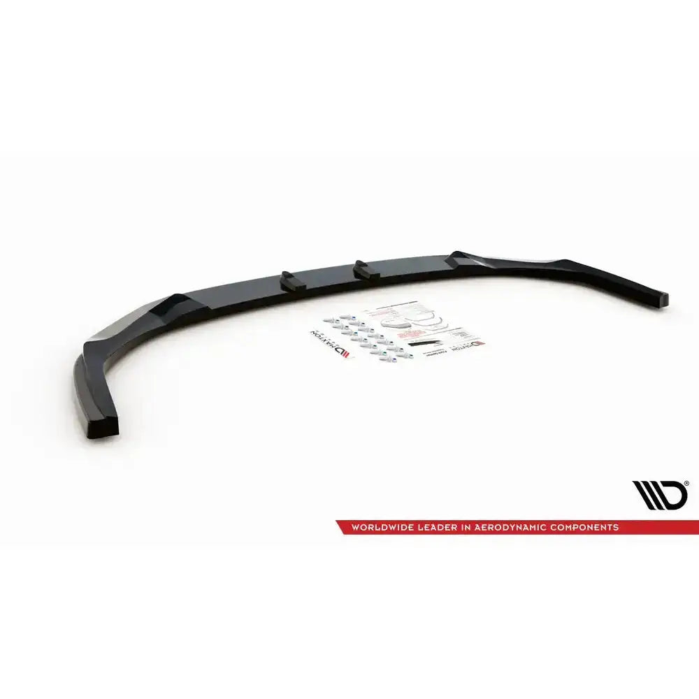 Front lip til Kia XCeed Mk1 2019-, sort glanset spoiler med monteringsutstyr og instruksjoner på hvit bakgrunn.