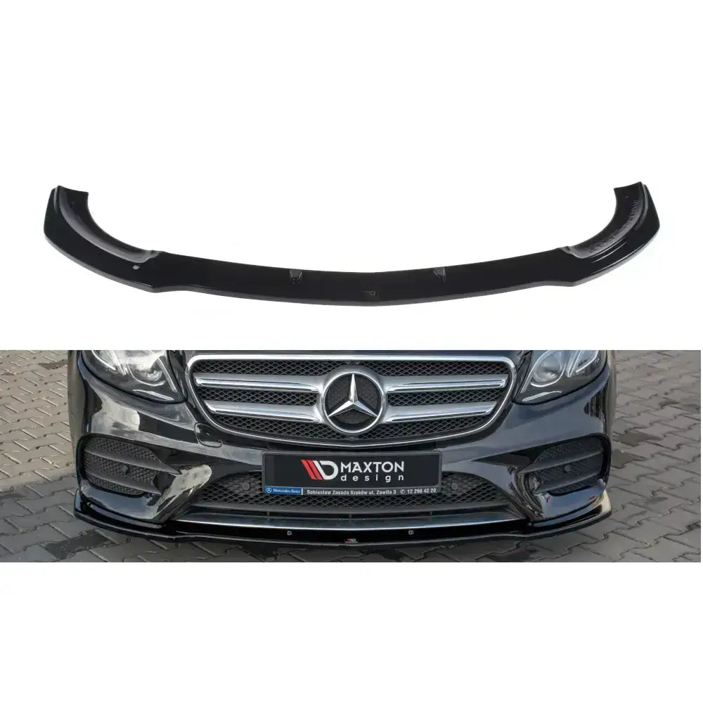 Frontspoiler til Mercedes E43 AMG W213, sort plast, vist som produkt og montert på svart bil forfra.