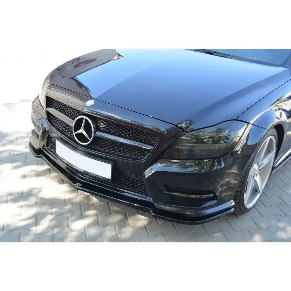 Frontleppe til Mercedes CLS C218 AMG Line med blank grill, store felger og ekstra splitter foran.