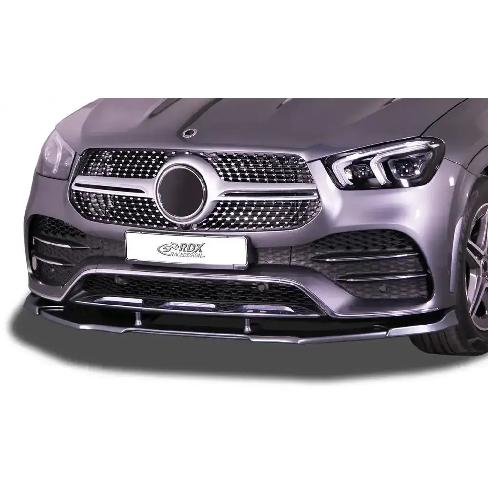 Frontspoiler Mercedes GLE AMG-Line V167 montert på grå bil, sort grill og sølvdetaljer sett forfra.