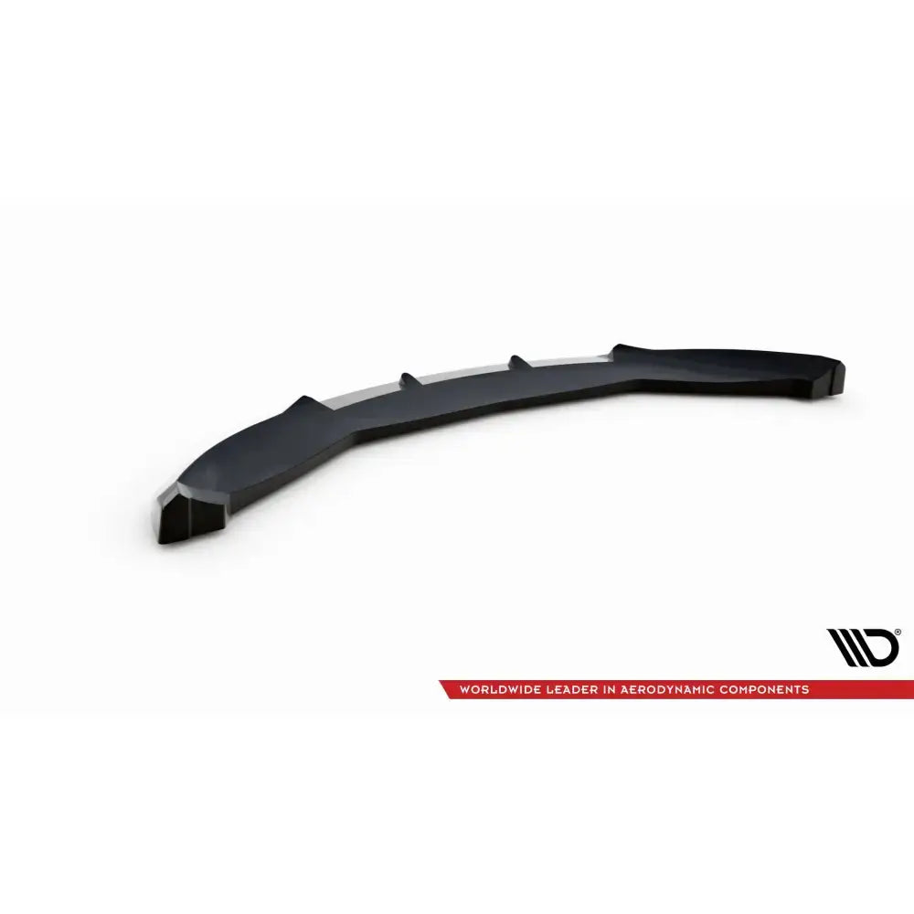 Frontspoiler til Mini Cooper Countryman R60 Facelift i sort plast med ribber, skrå vinkel mot hvit bakgrunn.