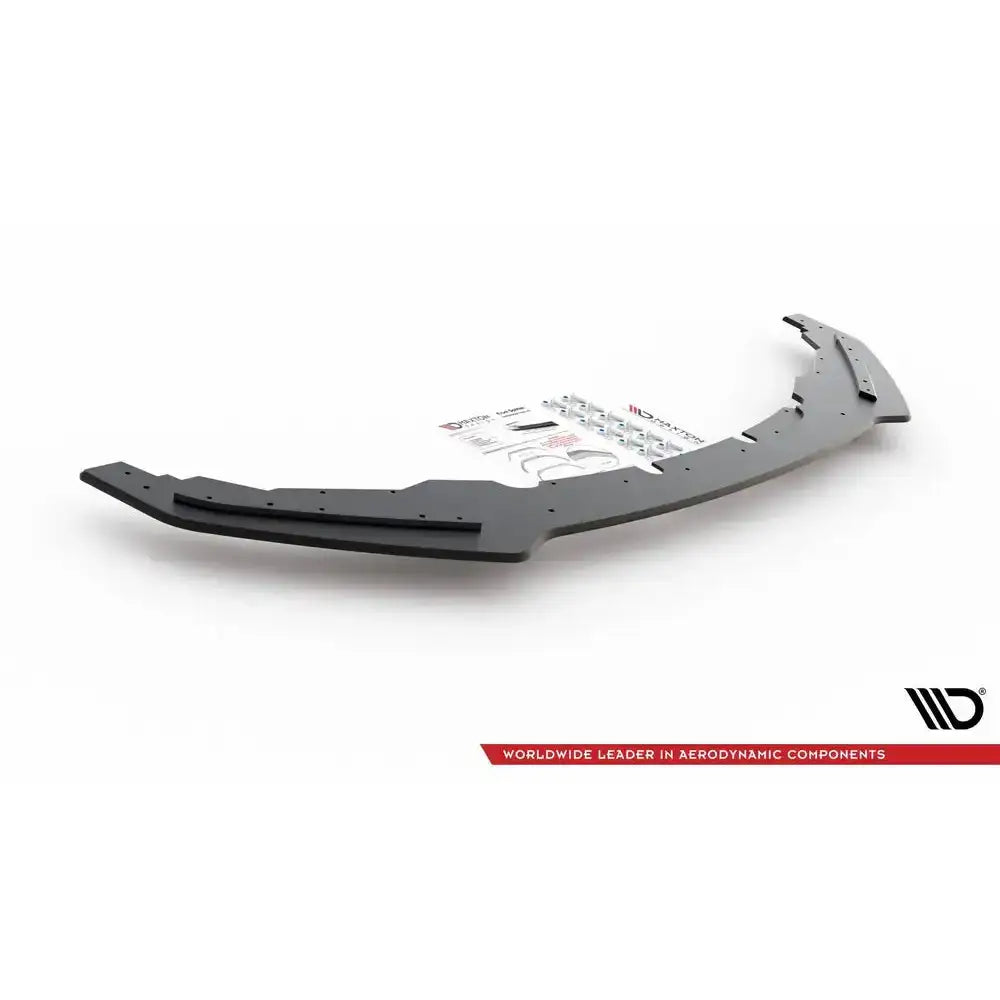 Frontspoiler BMW M135i F20 Racing sort splitter med monteringssett og instruksjoner på hvit bakgrunn.