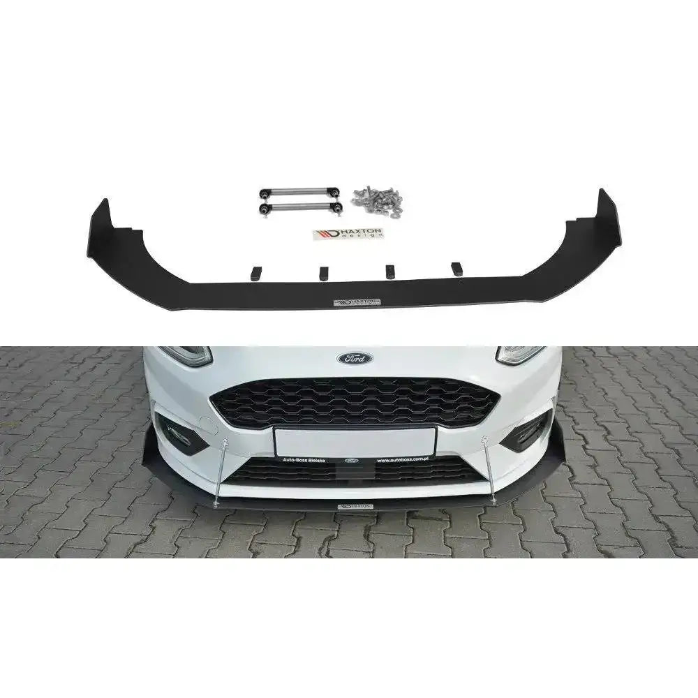 Frontspoiler til Ford Fiesta Mk8 ST, sort plast, sett ovenfra med festedeler og montert på hvit bil.