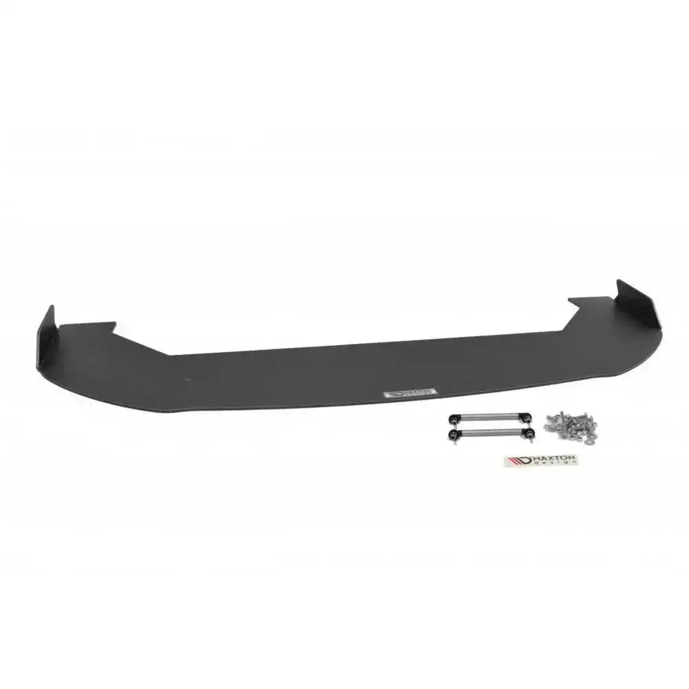 Frontspoiler Mitsubishi Lancer Evo X Racing V.2 sett forfra med stag, skruer og logomerke på hvit bakgrunn.