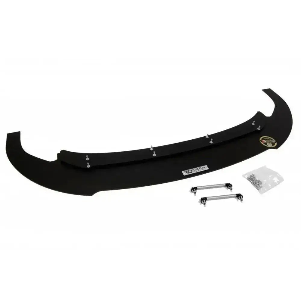 Front splitter VW Golf Mk6 GTI 35th Racing sett ovenfra med monteringsdeler og klistremerker.