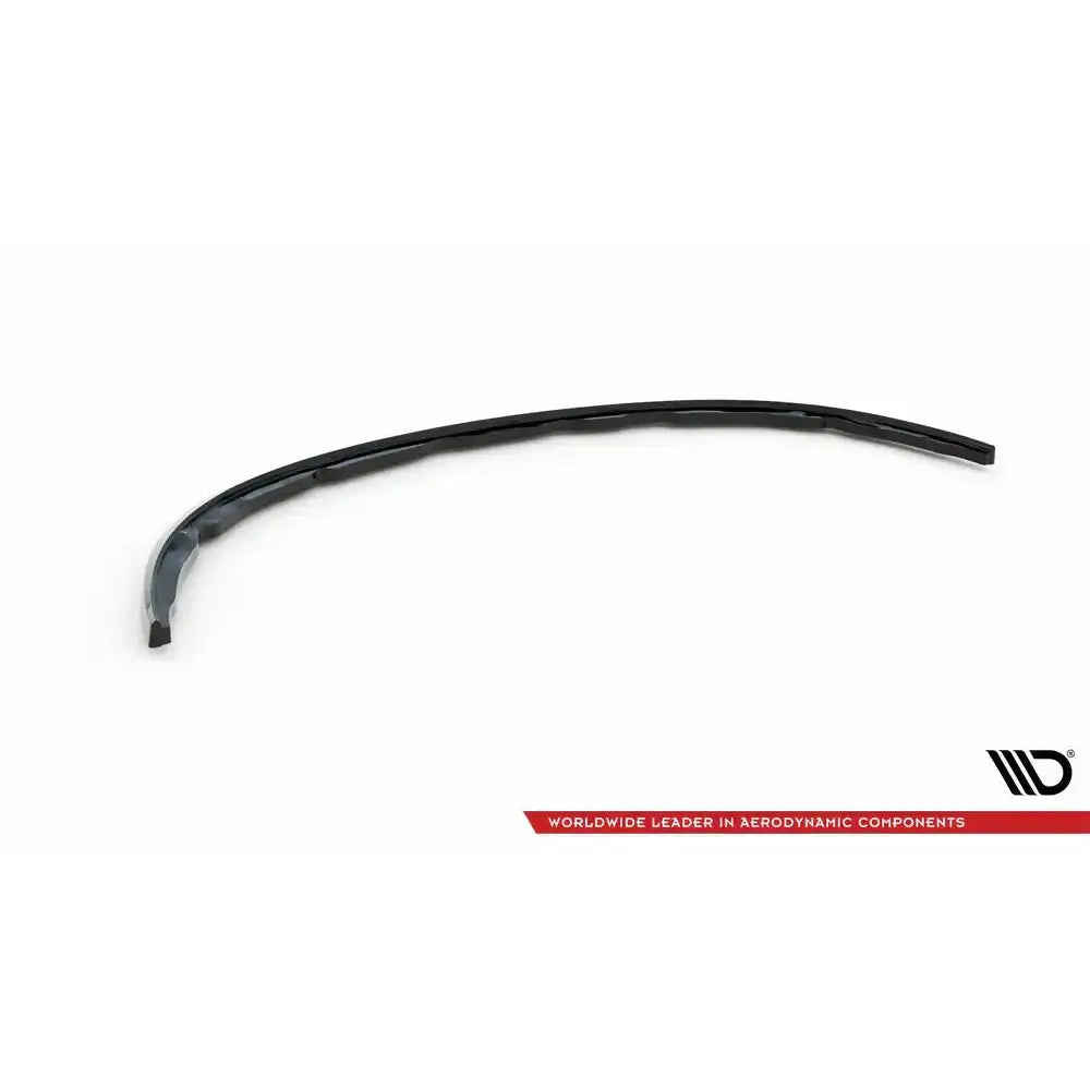 Frontspoiler til Renault Clio III Rs i sort plast, vist fra skrå vinkel mot hvit bakgrunn.