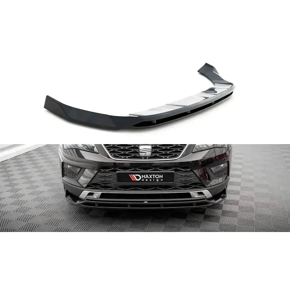 Frontspoiler til Seat Ateca Mk1 16-20, sort plast med rette linjer, montert og løst på rutemønstret gulv.