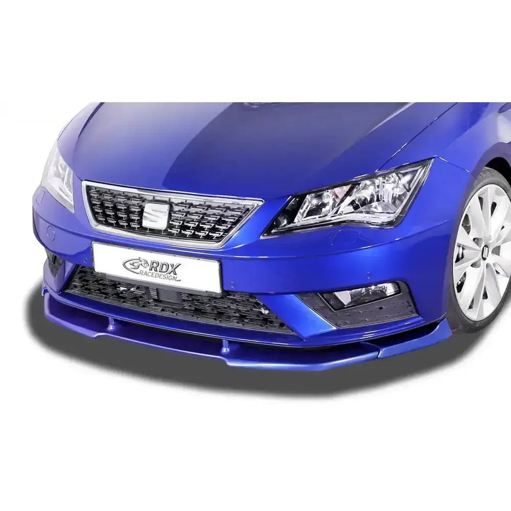 Frontspoiler på blå Seat Leon 5F SC/ST 17- med lav spoiler, grill og frontfanger i nærbilde.