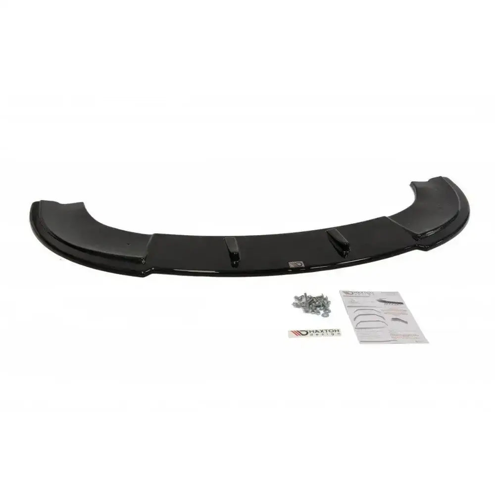 Front lip til Seat Leon Mk2 Ms Design, svart buet spoiler med monteringssett og instruksjoner på hvitt underlag.