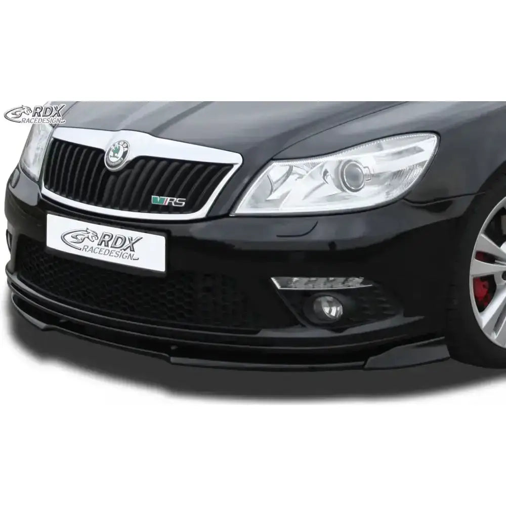Frontleppe på Skoda Octavia 2 RS Facelift 1Z, sort bilfront med krom grill og hovedlykt.