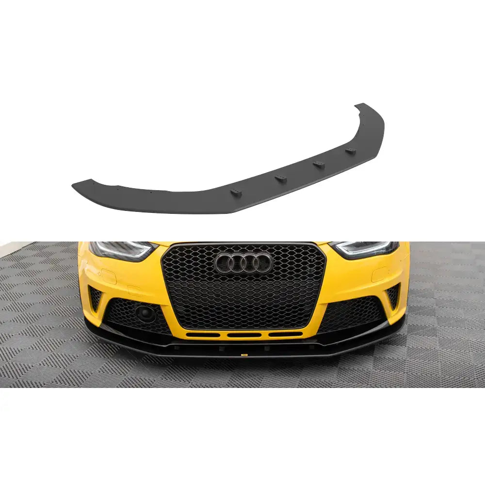 Frontspoiler Audi RS4 B8 Street Pro i sort plast sett fra skrå vinkel, montert på gul bil.