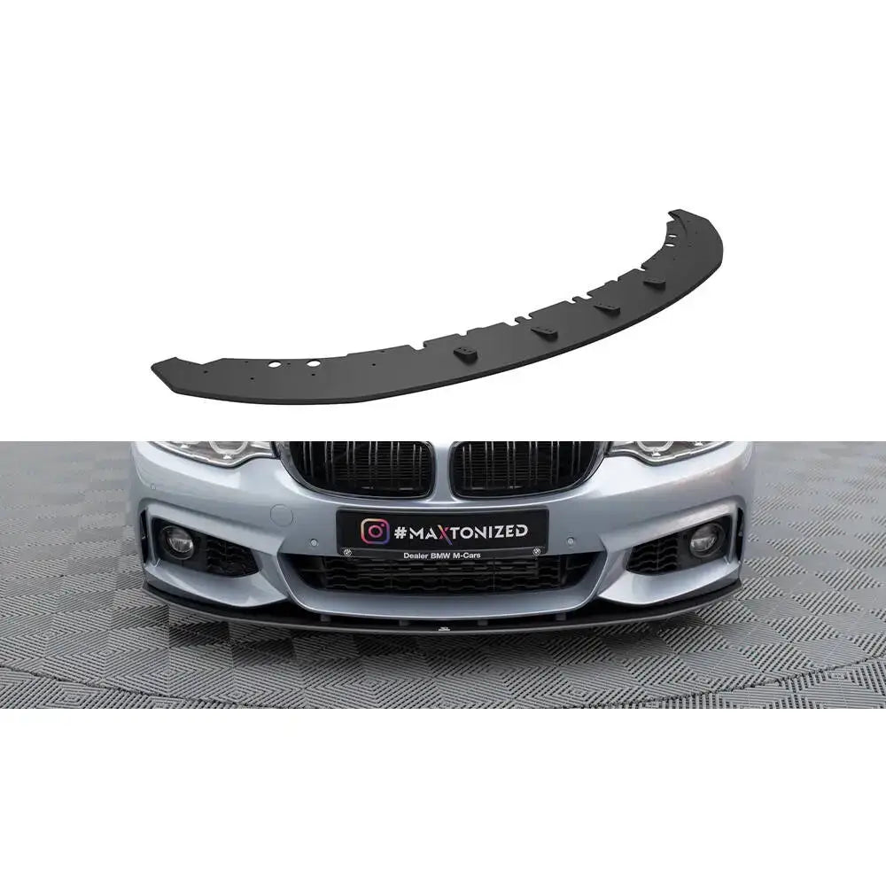 Frontspoiler BMW 4 Coupe M-Pack F32 Street Pro i sort plast, vist skrått og montert på sølvfarget bil.