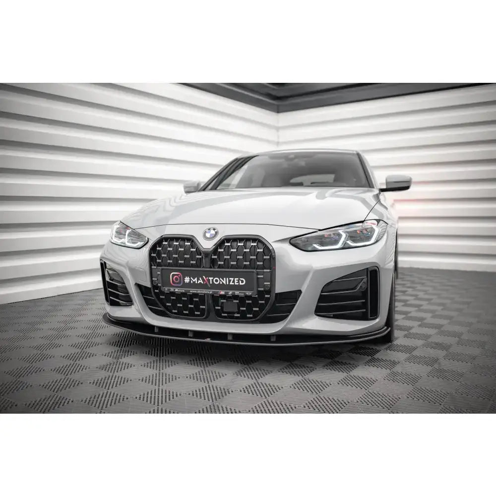 Frontleppe på BMW 4 Gran Coupe G26 M-Pack med sorte luftinntak og markant grill.