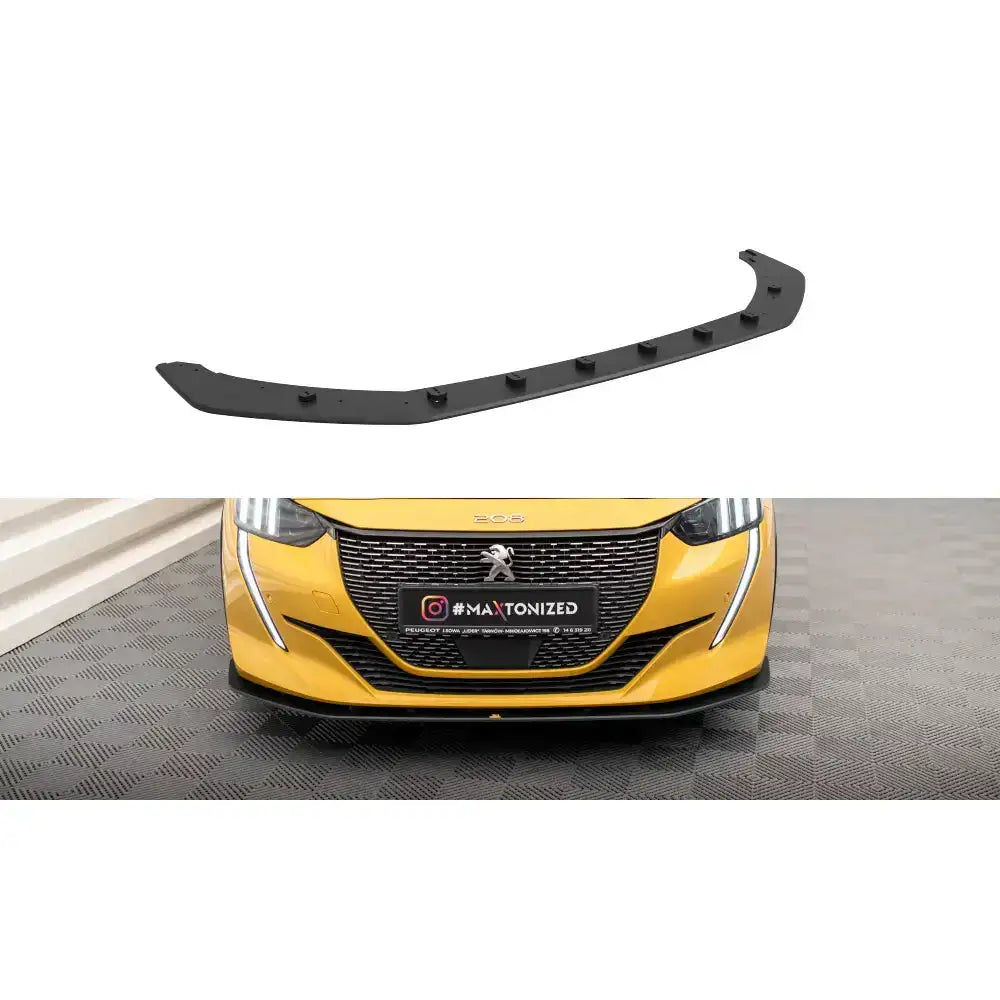 Frontspoiler Peugeot 208 GT Mk2 Street Pro V.2 i sort plast montert på gul bil, sett ovenfra.