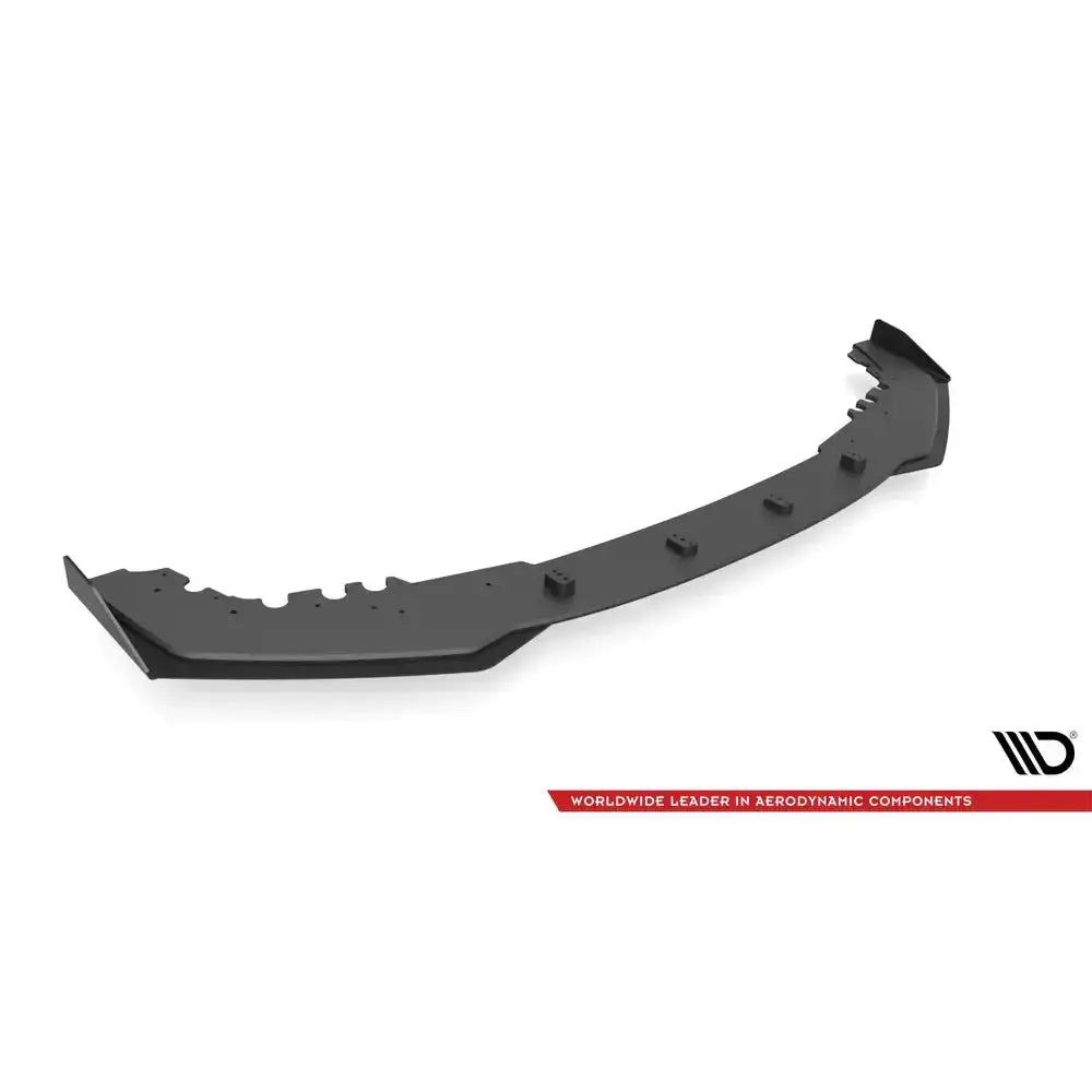 Front lip til BMW M2 F87 Street Pro V.1 med flaps, sort plast med markerte kanter, sett skrått ovenfra.