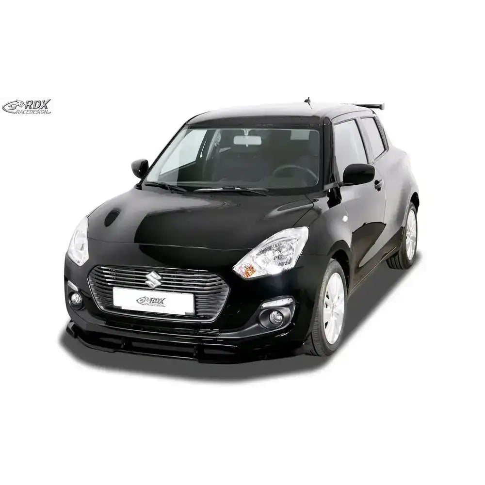 Frontleppe Suzuki Swift RZ/AZ med sølvdetaljer på grill og lys, hvite felger og aerodynamisk design.